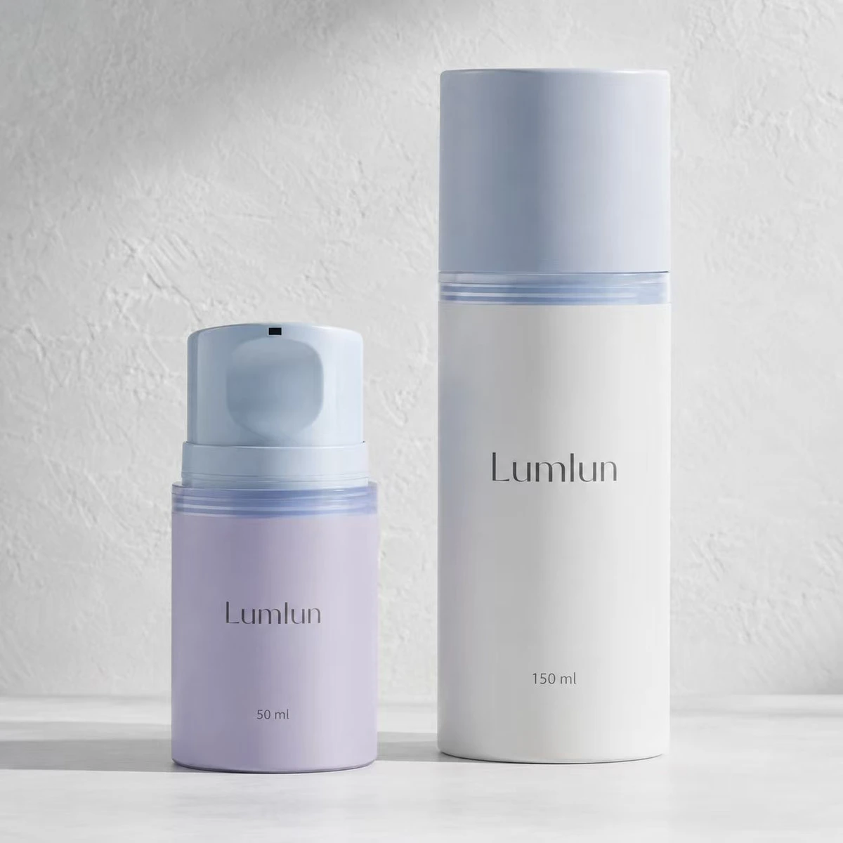 Presentación de botellas airless PP LumLun de 50 ml y 150 ml