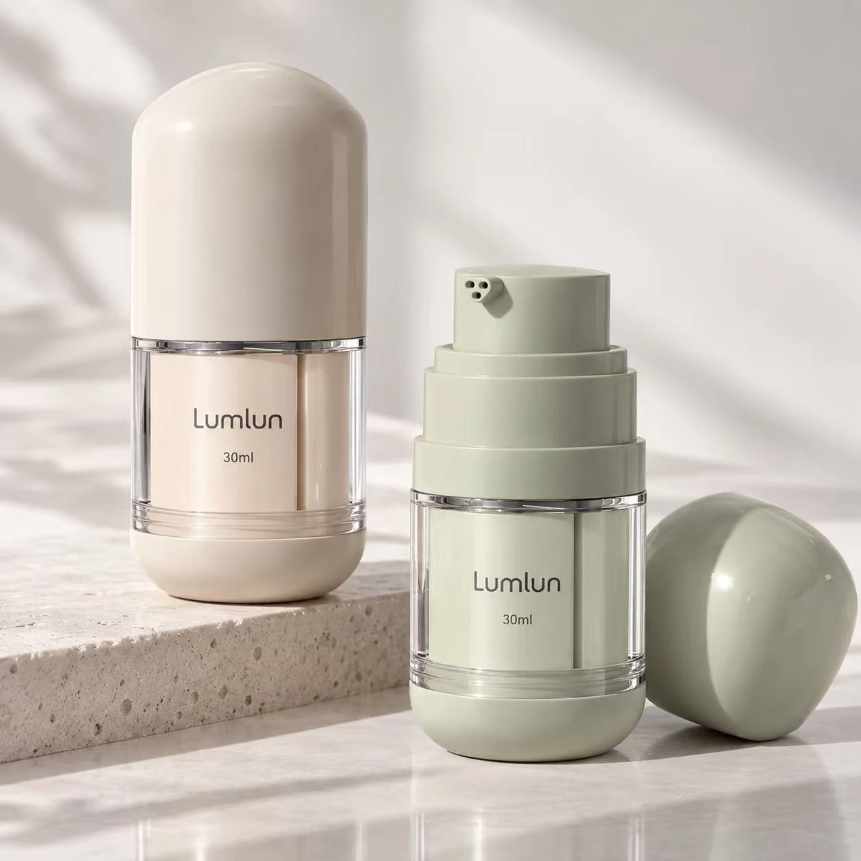 LumLun triple-chamber airless bottles with rounded caps and exposed multi-outlet pumps