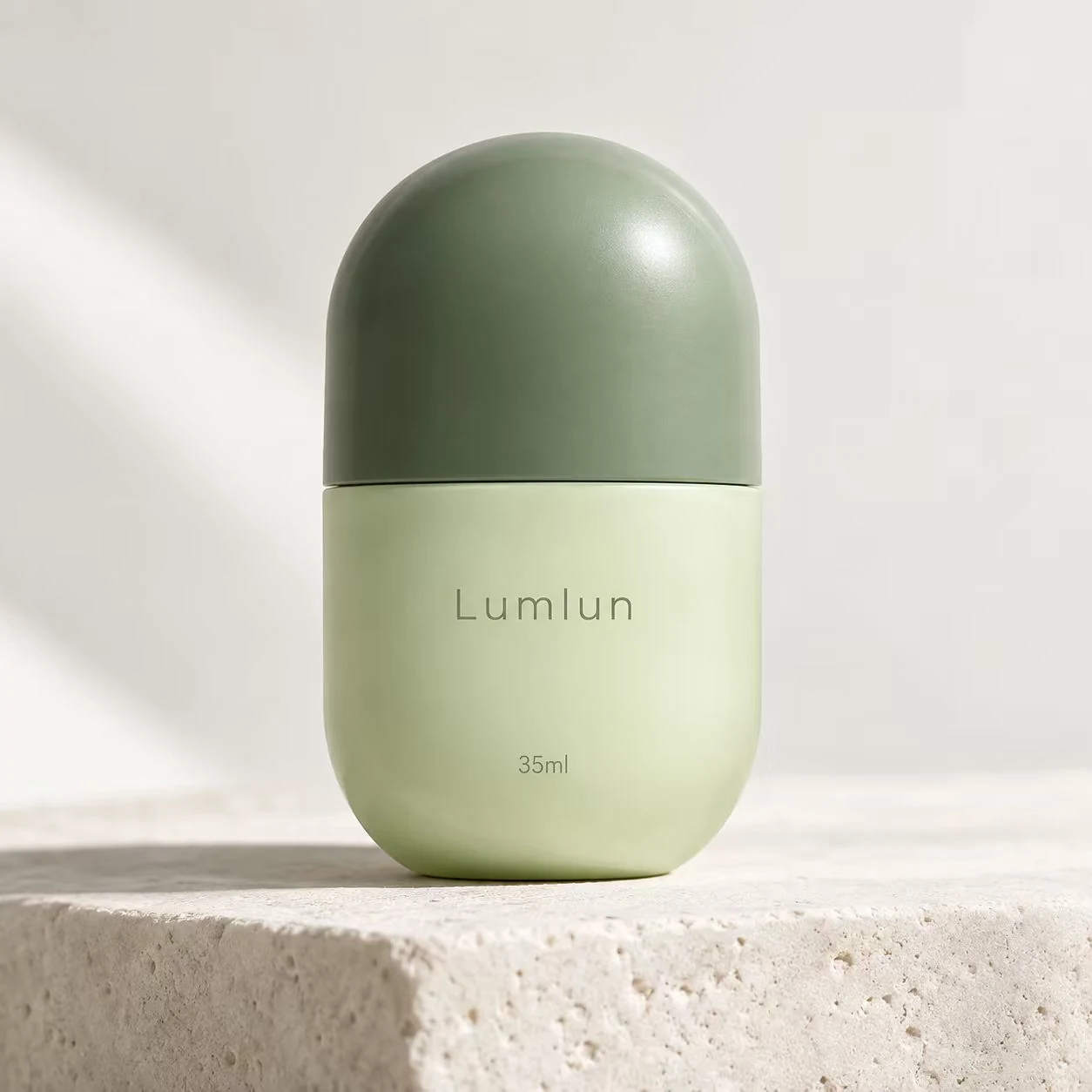 LumLun green capsule-style PP airless bottle with rounded cap