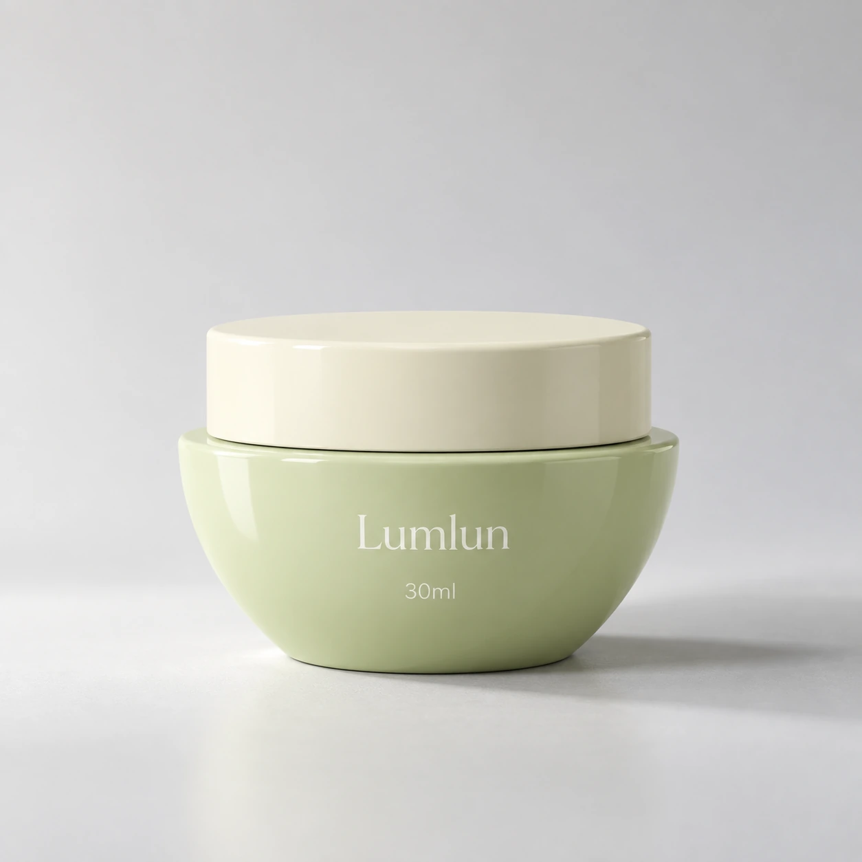 Tarro de crema LumLun de PP de 30 ml con forma de cuenco en verde suave y tapa crema