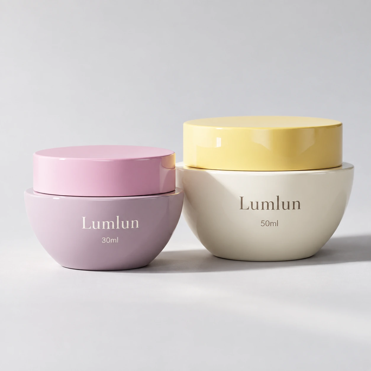 LumLun PP bowl-shaped cream jars showing a pink 30ml jar and a cream 50ml jar