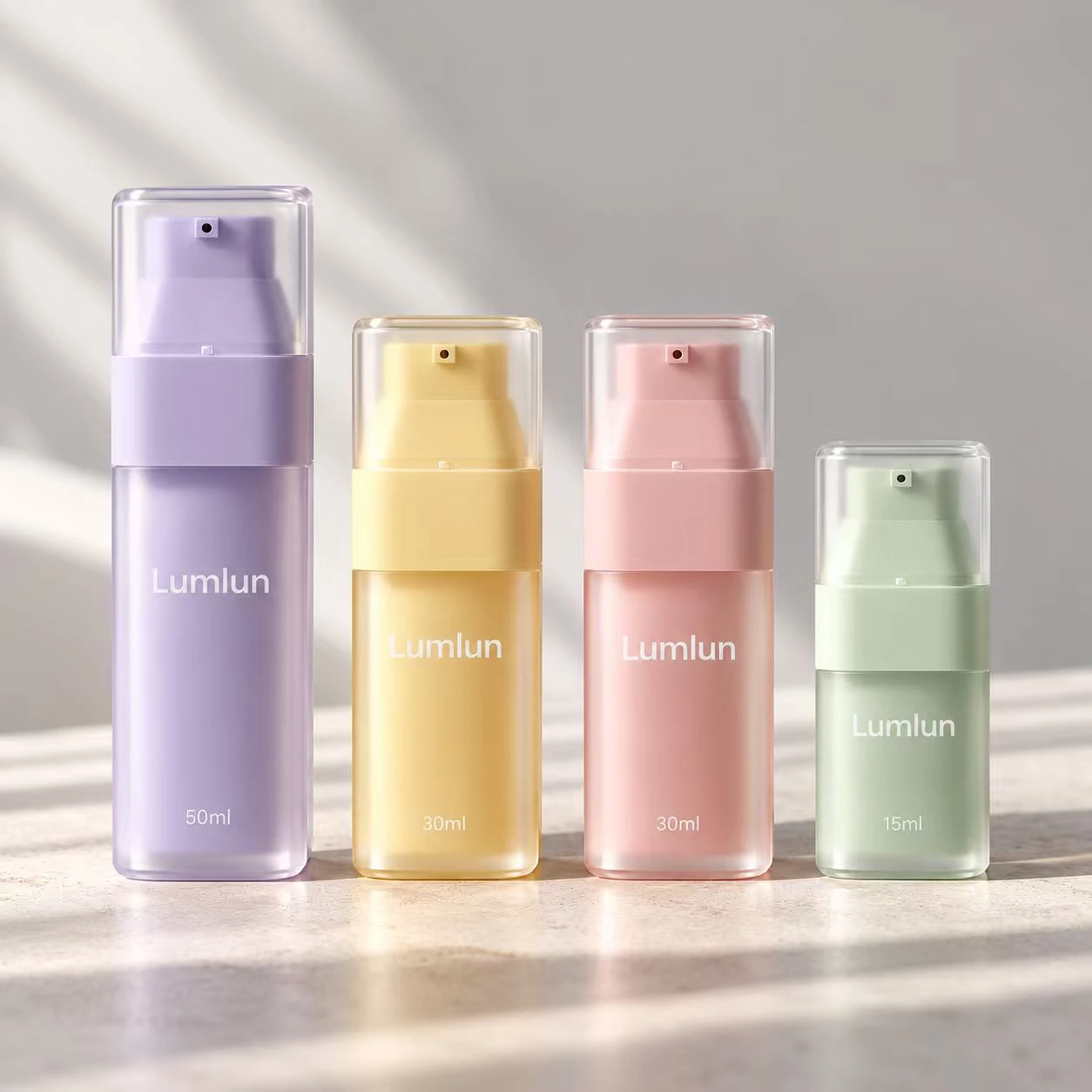 LumLun Sortiment eckiger Airless-Flaschen aus PP + PS in Pastellfarben mit Größenrichtungen 15, 30 und 50 ml